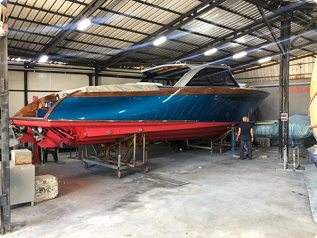 a painted boated in the garage